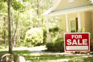 For sale sign in front yard